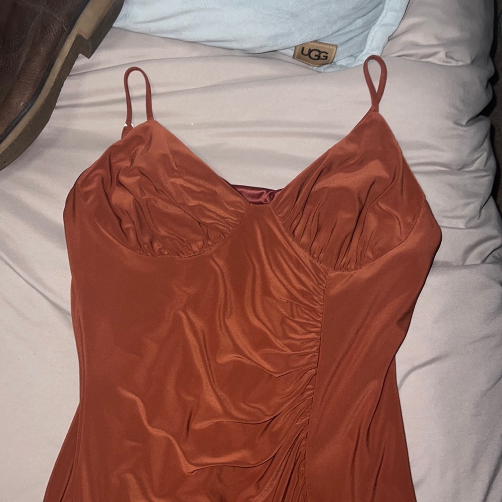 The dress is in perfect condition only worn once when I was a bridesmaid